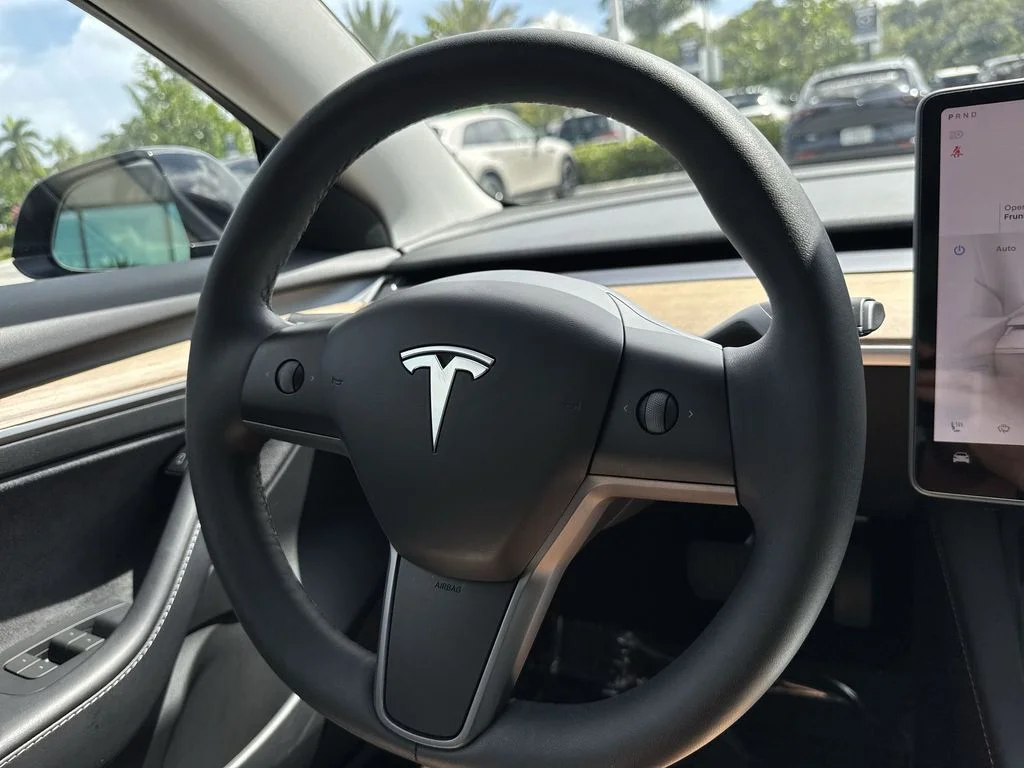 Used 2023 Solid Black Tesla  image 55
