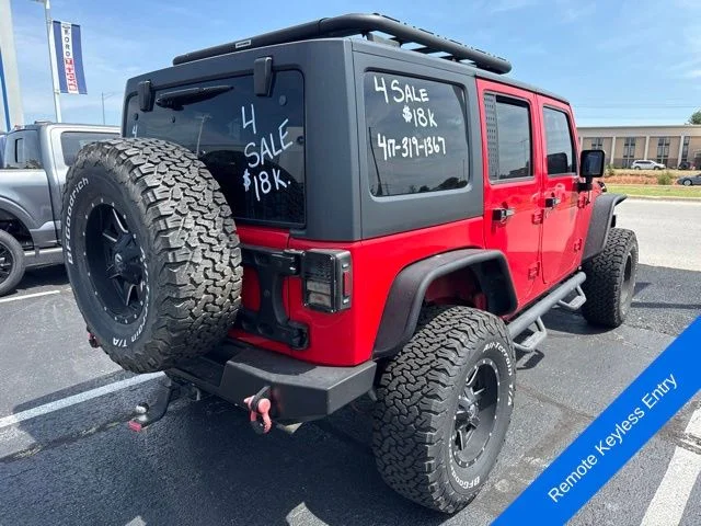 Used 2015 Firecracker Red Jeep Unlimited Sport image 8