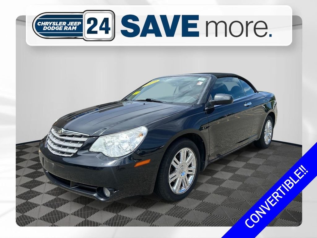 Used 2009 Black Chrysler Limited image 1
