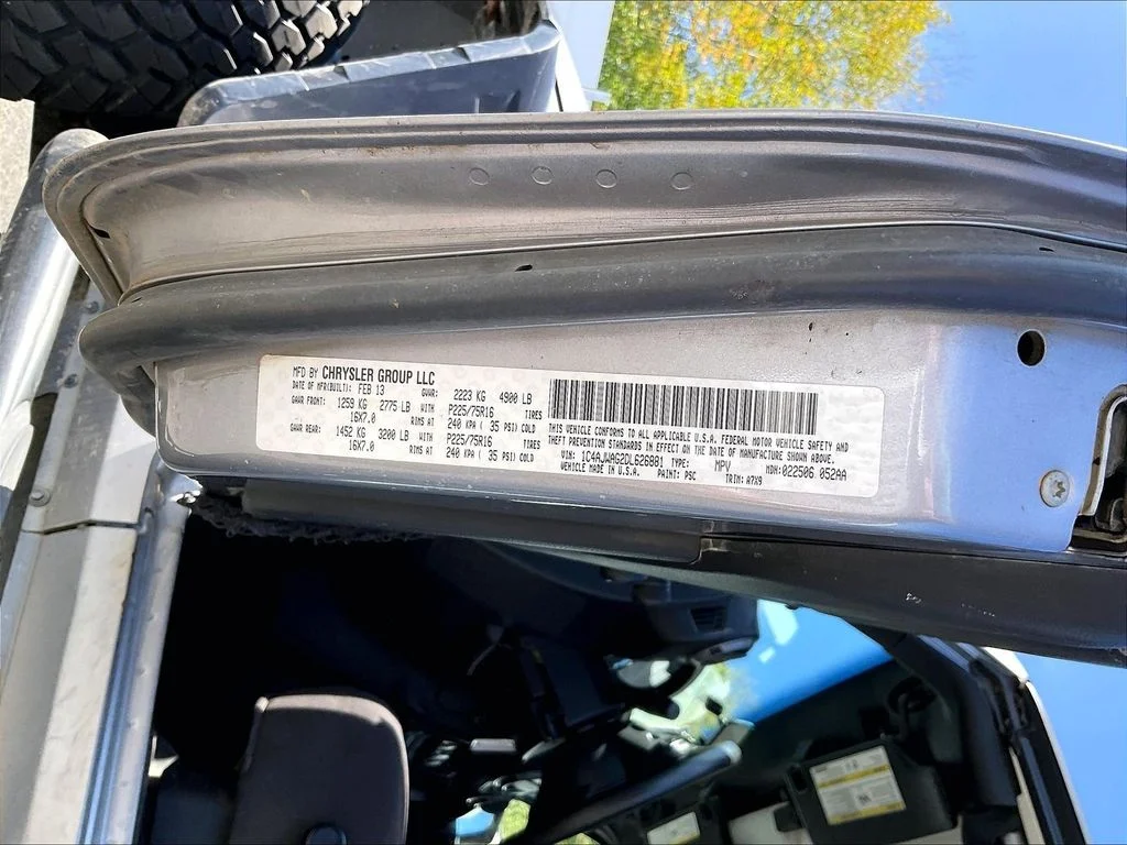 Used 2013 Billet Metallic Clearcoat Jeep Sport image 6