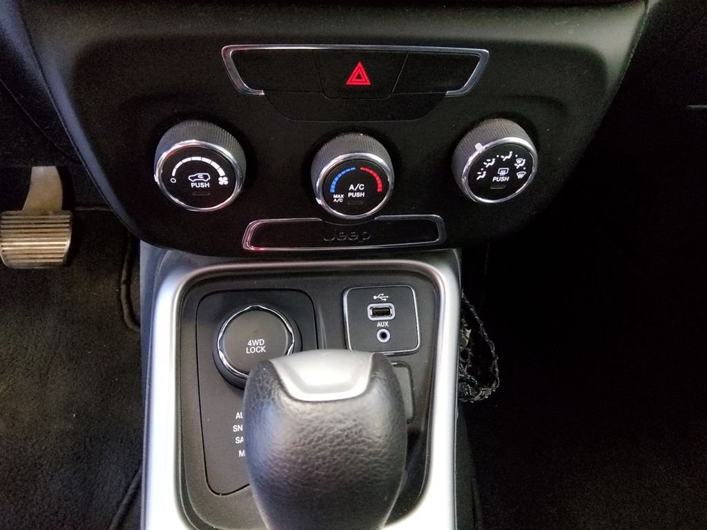 Used 2018 Orange Jeep Sport image 28