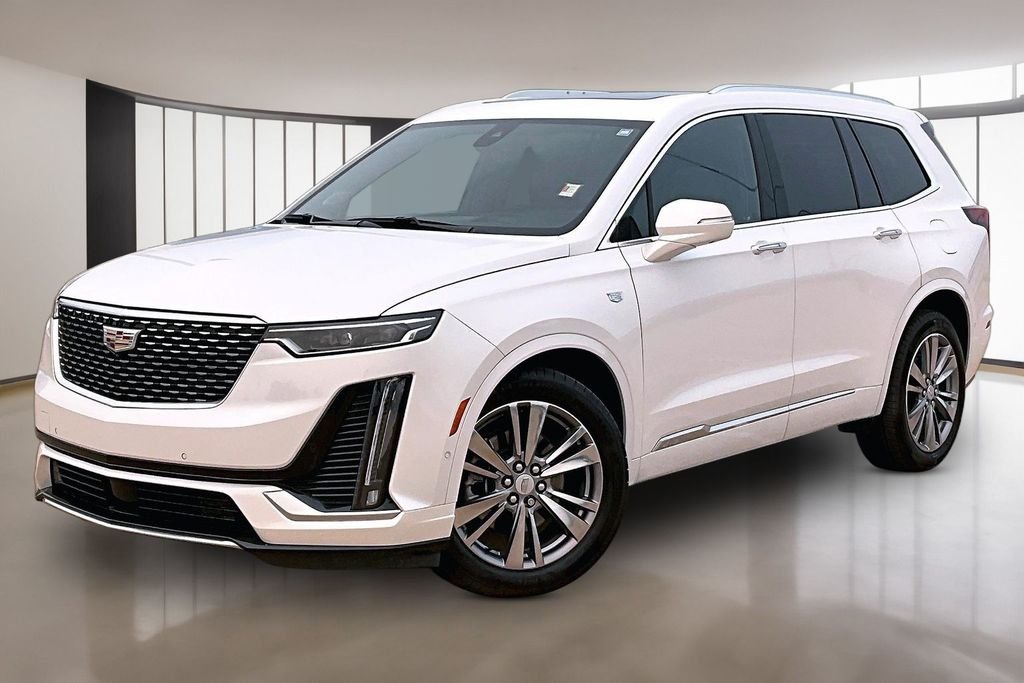 Used 2025 White Cadillac Premium Luxury image 1