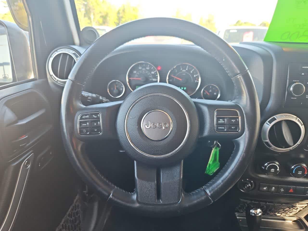Used 2014 Black Clear Coat Jeep Sahara image 16