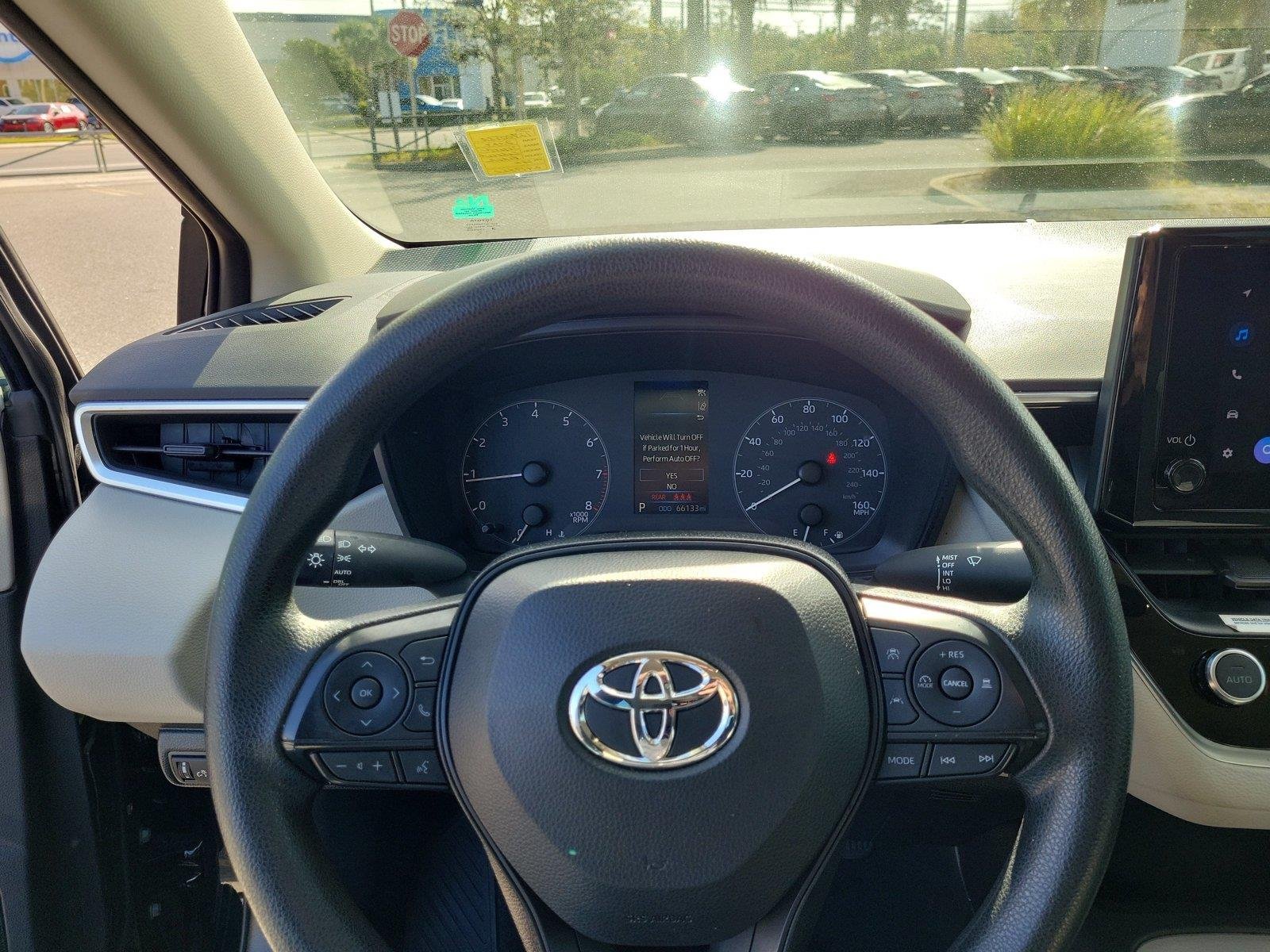 Used 2024 Midnight Black Metallic TOYOTA LE image 24