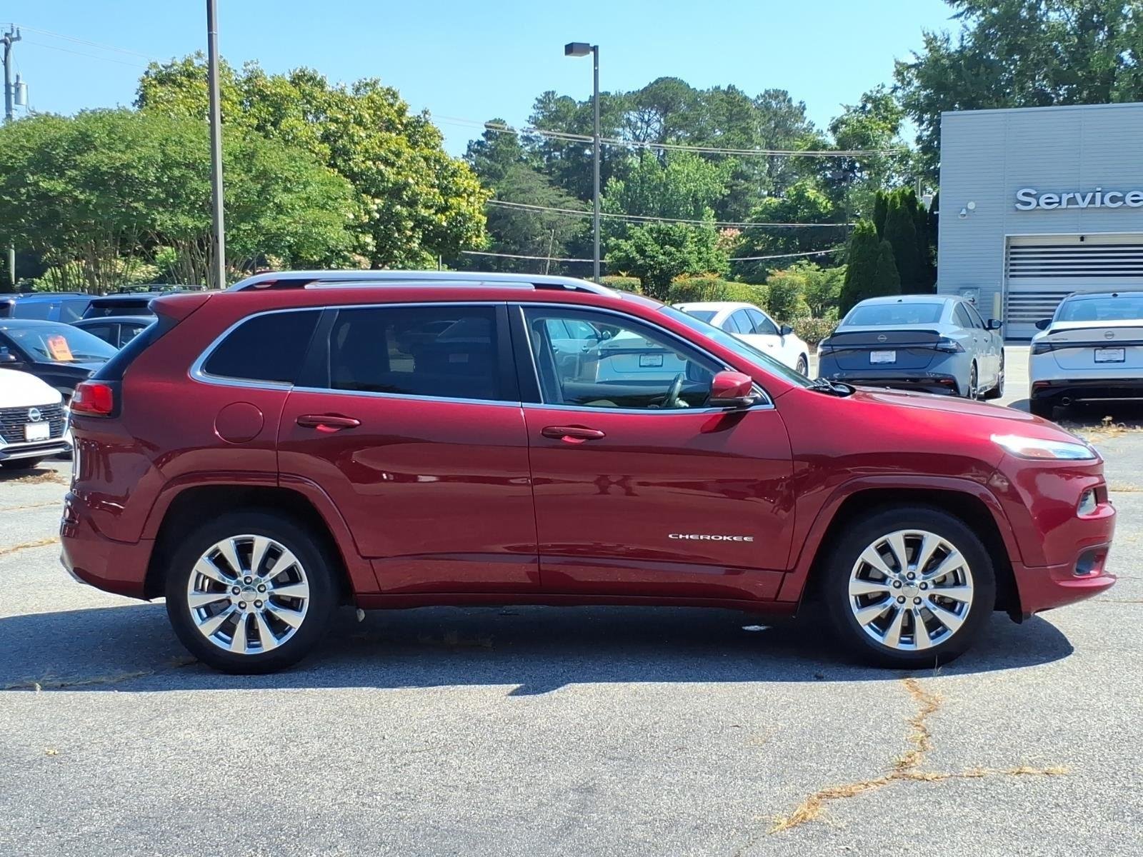 Used 2016 Deep Cherry Red Crystal Pearlcoat Jeep Overland image 6