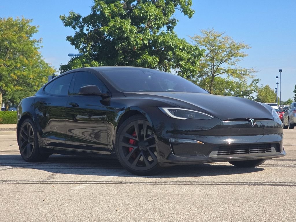 Used 2024 Solid Black Tesla Plaid image 1