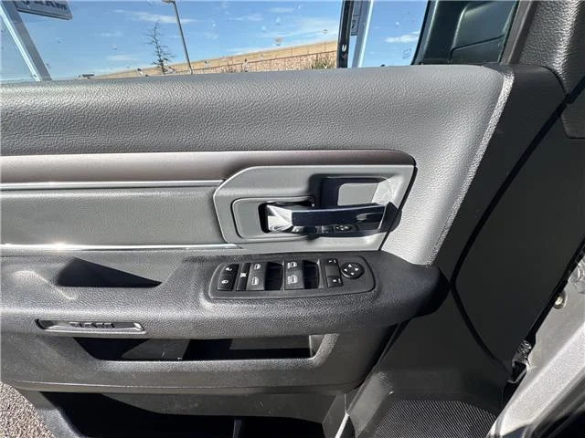 Used 2024 Granite Crystal Metallic Clearcoat RAM SLT 4x4 Quad Cab 6.3 ft. box 140 in. WB image 17