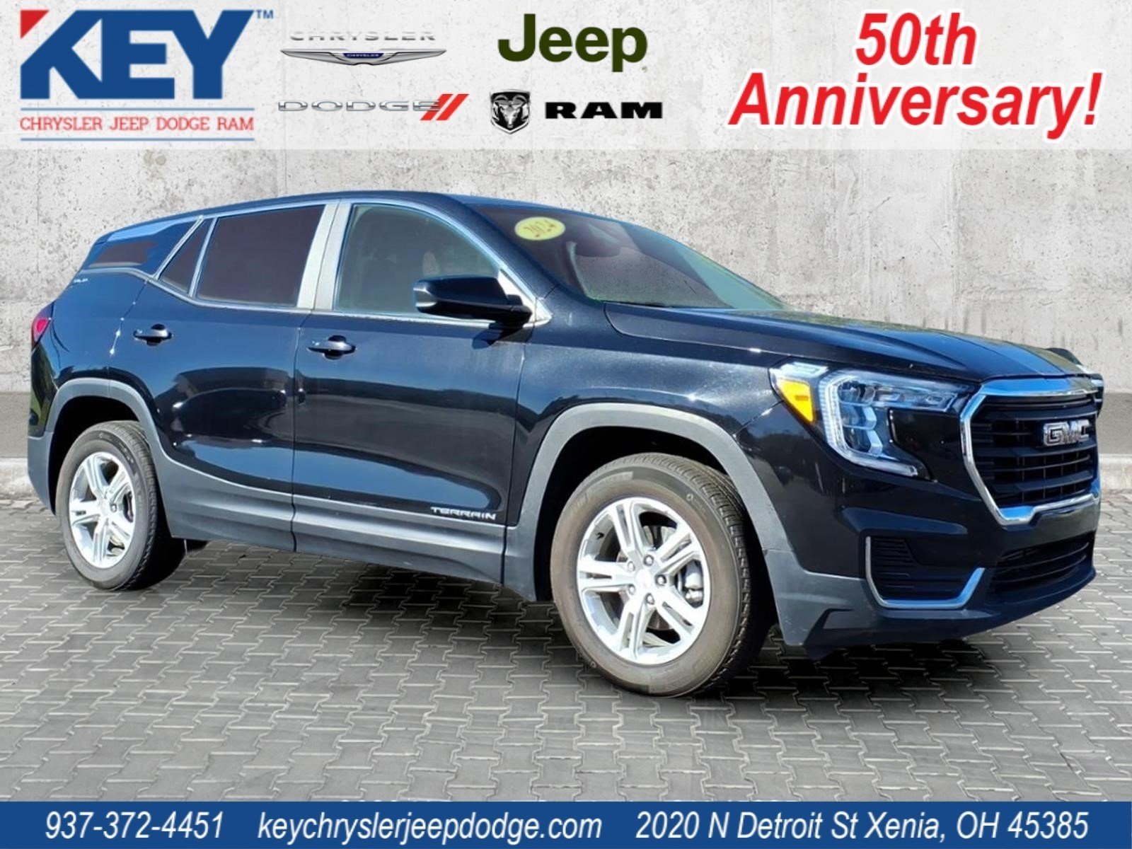Used 2024 Ebony Twilight Metallic GMC SLE image 1
