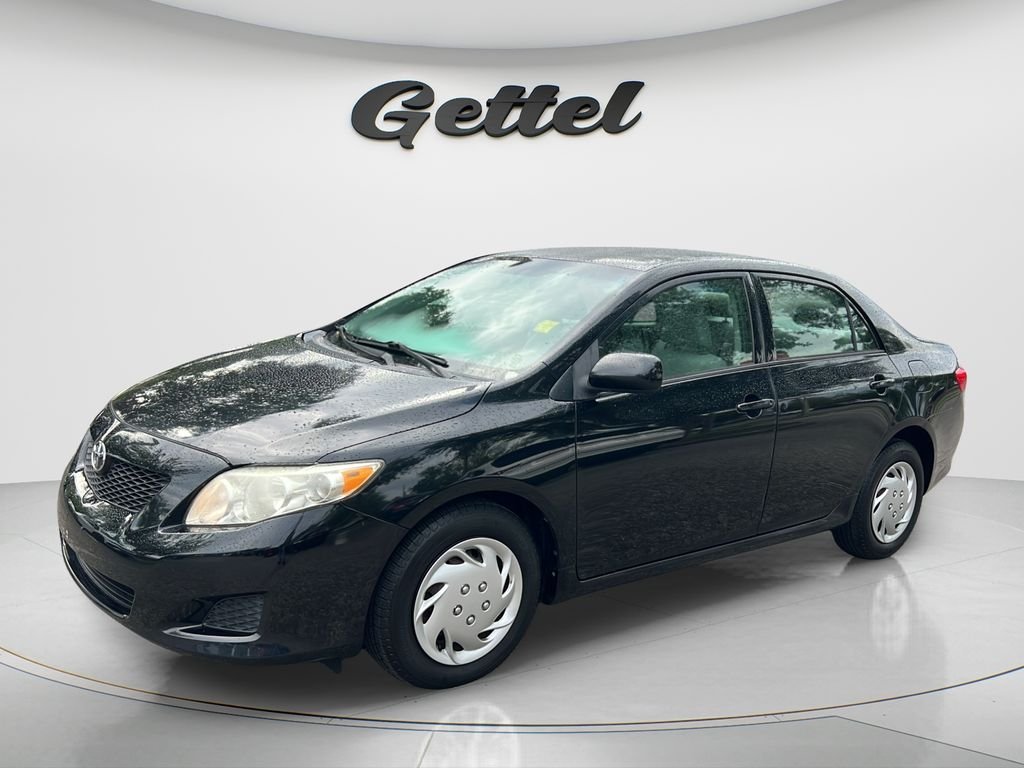 Used 2009 Black Toyota LE image 1