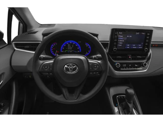 Used 2021 Super White Toyota Hybrid LE image 7