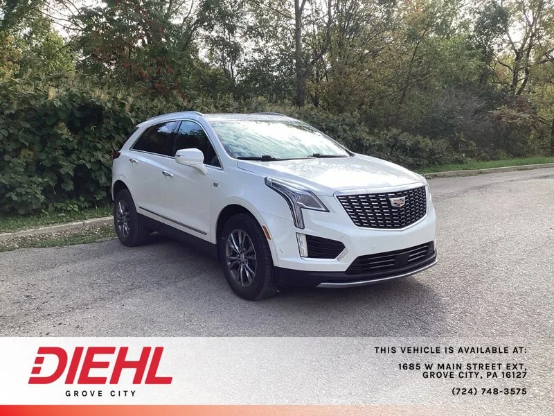 Used 2021 White Cadillac Premium Luxury image 1