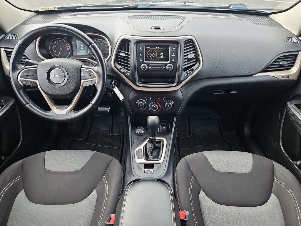 Used 2016 Granite Crystal Metallic Clearcoat Jeep Sport image 22