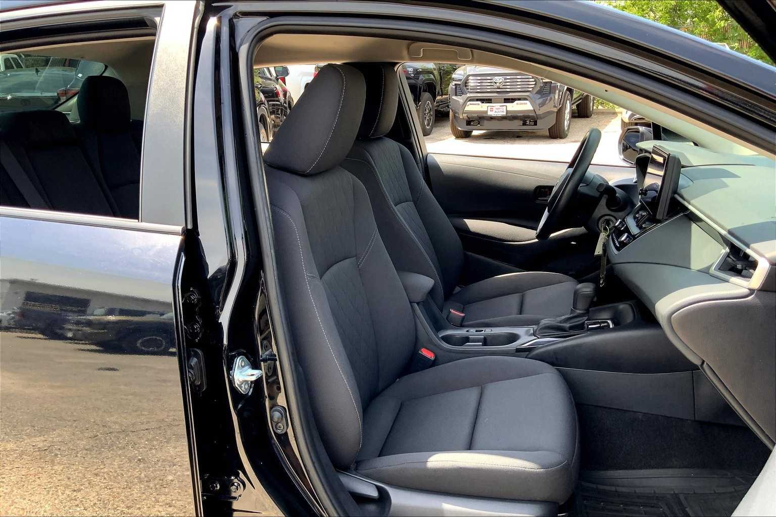 Used 2023 Midnight Black Metallic Toyota LE image 9