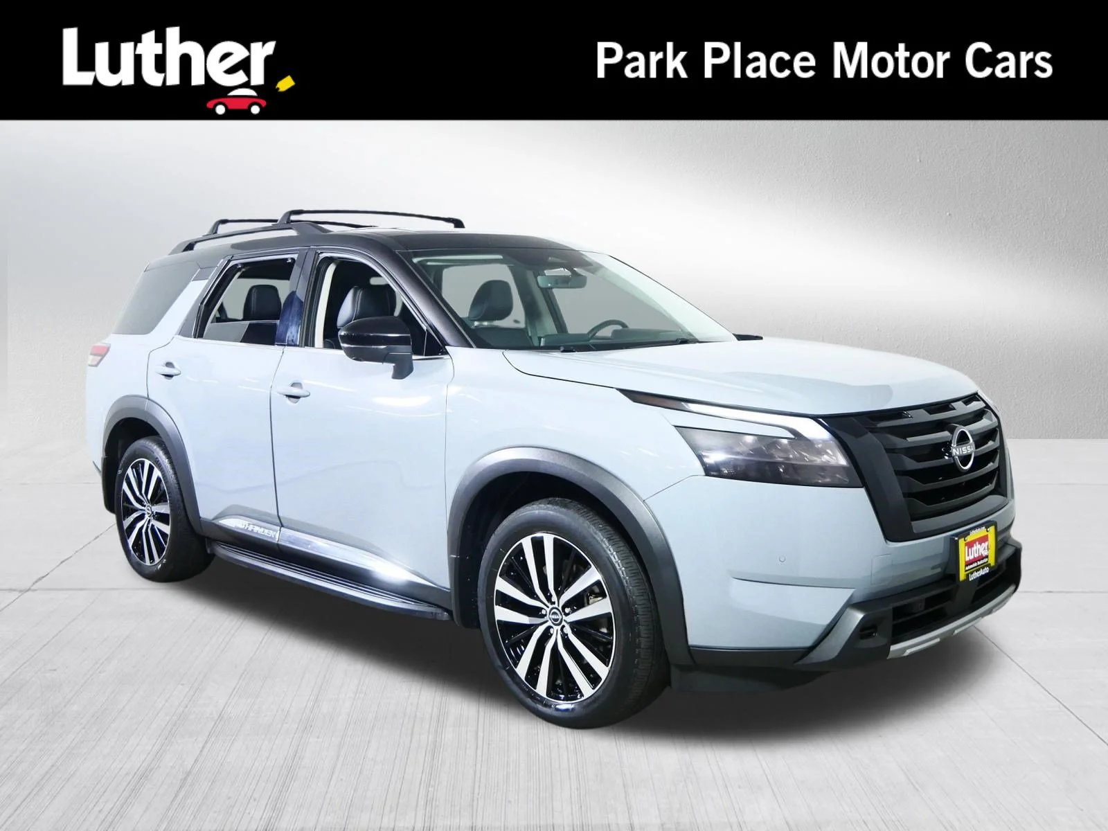 Used 2024 Solid Gray/Super Black Nissan Platinum image 1