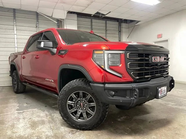 Used 2024 Volcanic Red Tintcoat GMC AT4X image 1