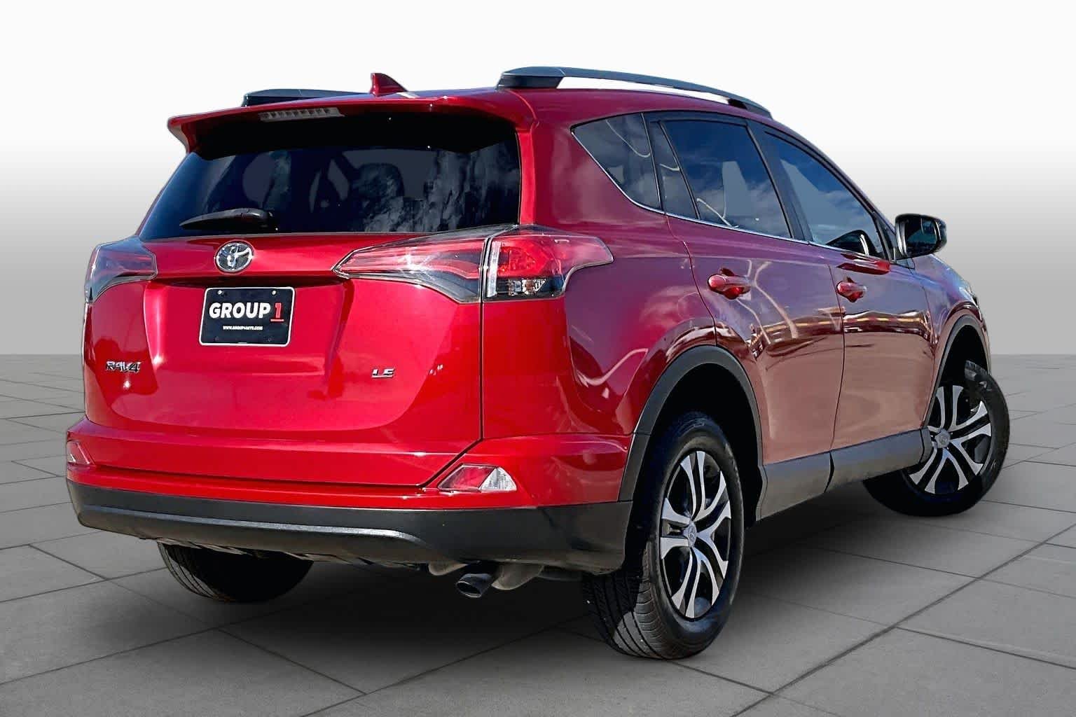Used 2017 Barcelona Red Metallic Toyota LE image 13