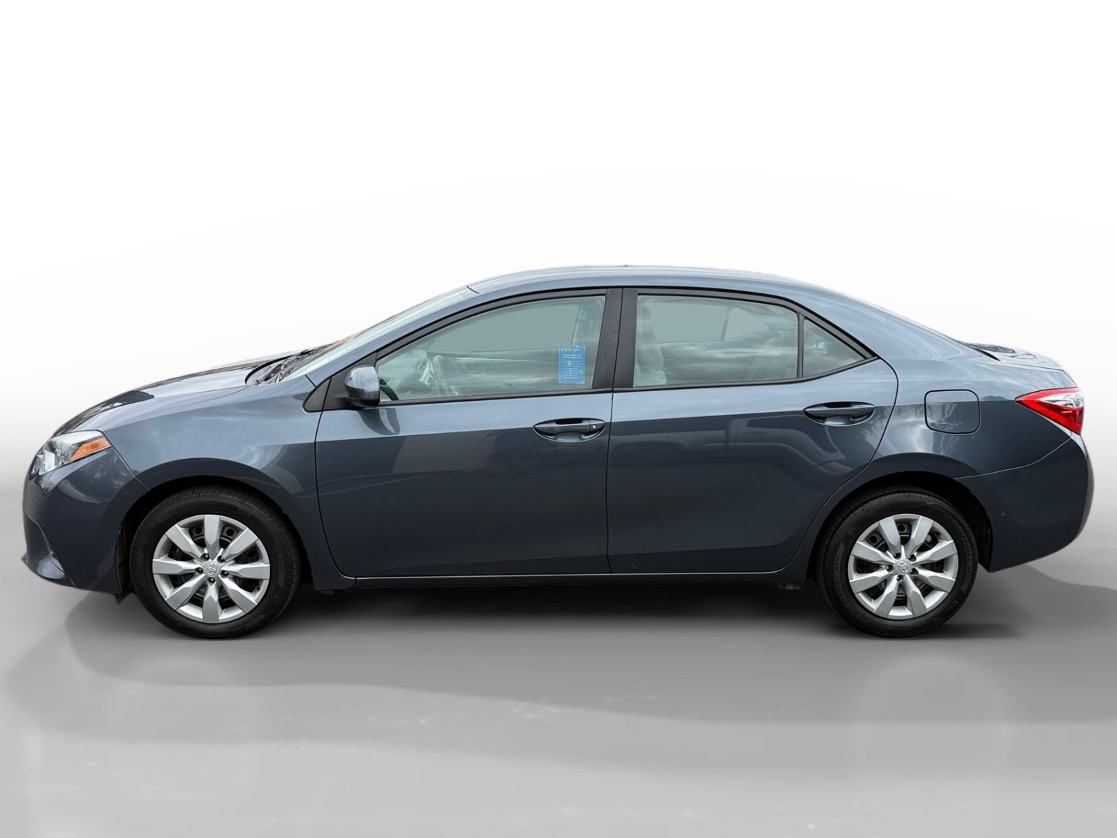 Used 2015 Slate Metallic Toyota LE image 2