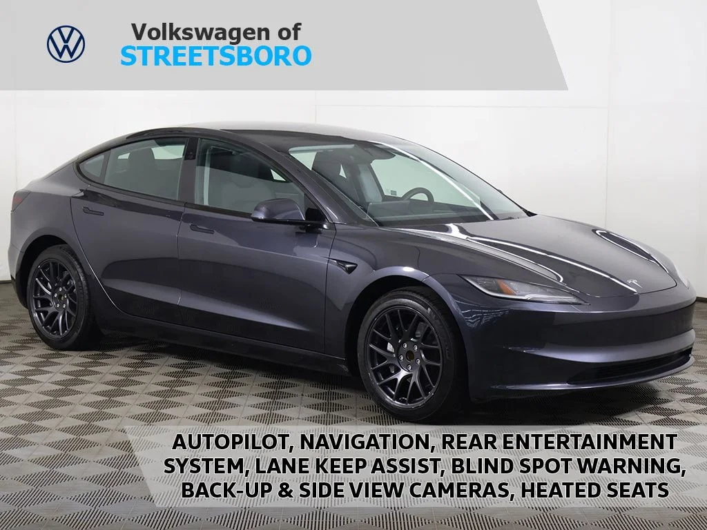 Used 2025 Stealth Gray Tesla Long Range image 1