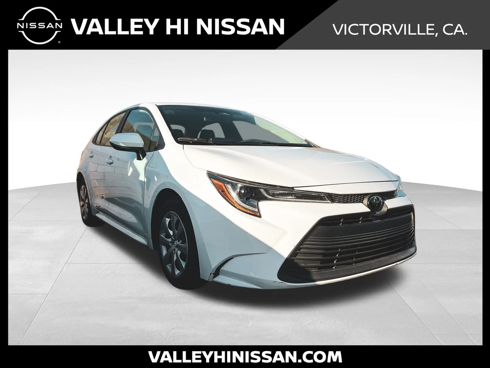 Used 2023 White Toyota LE image 1