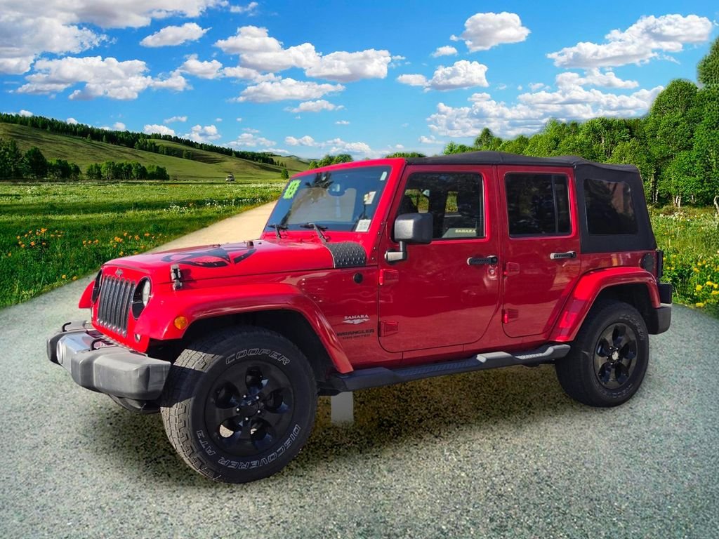 Used 2015 Red Jeep Unlimited Sahara image 2