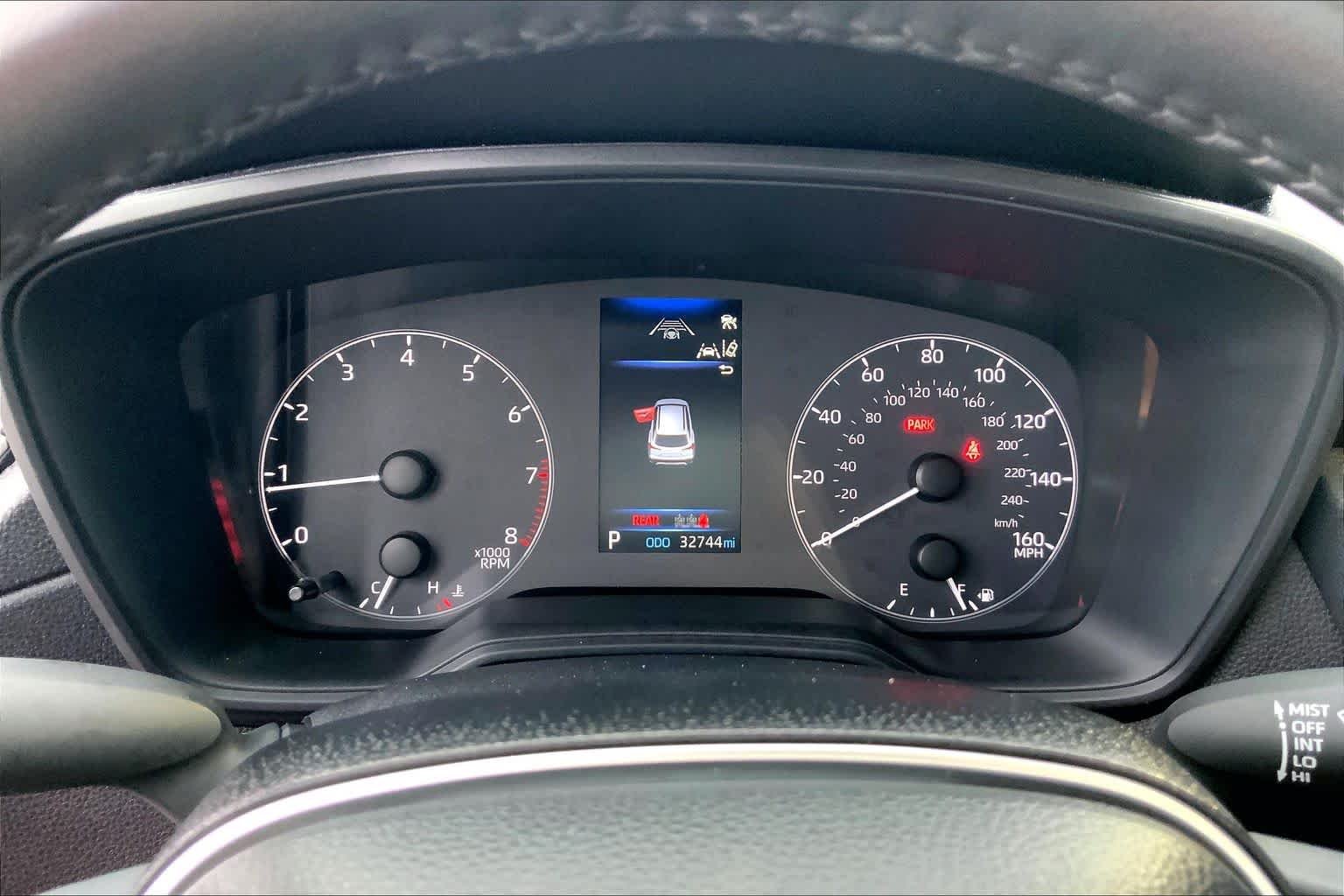 Used 2024 Blue Crush Metallic Toyota LE image 26