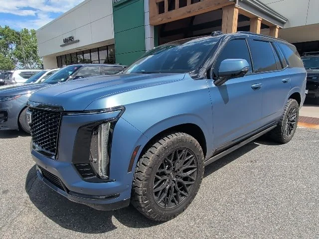 Used 2025 Blue Cadillac Sport Platinum image 1