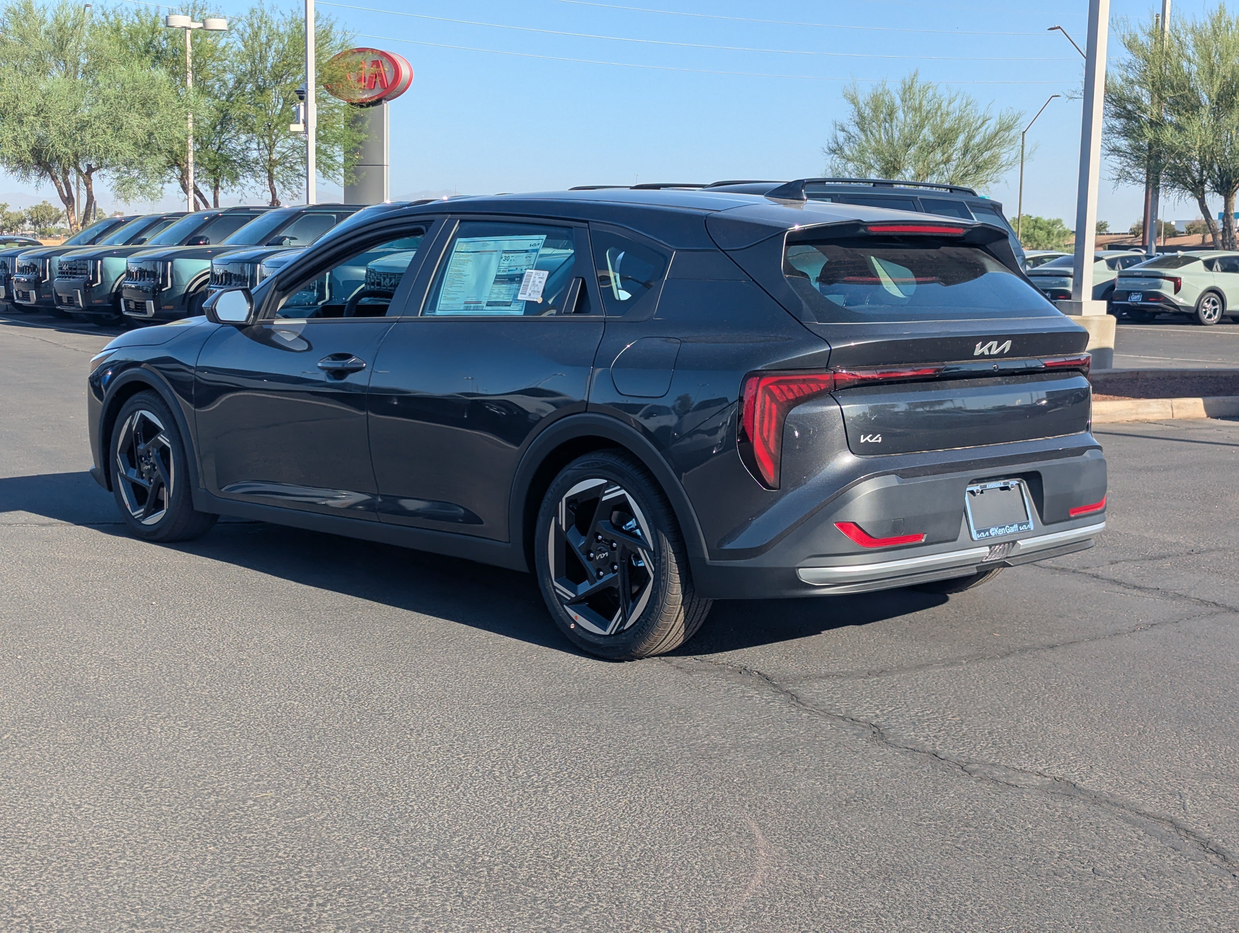 New 2026 Interstellar Gray Kia EX image 3