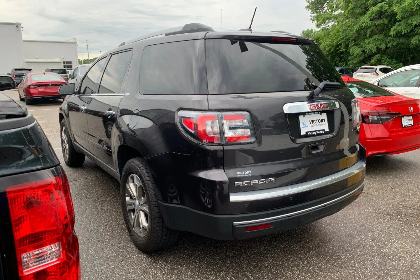 Used 2016 GMC Acadia SLT-1 with VIN 1GKKRRKD1GJ318057 for sale in Michigan City, IN