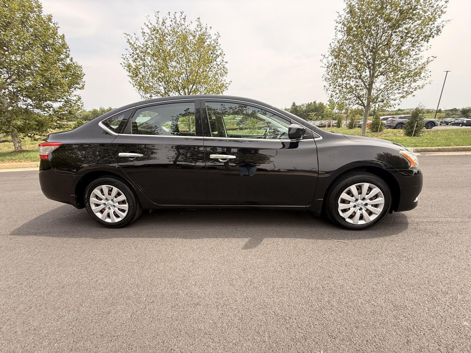 Used 2015 Super Black Nissan S image 4