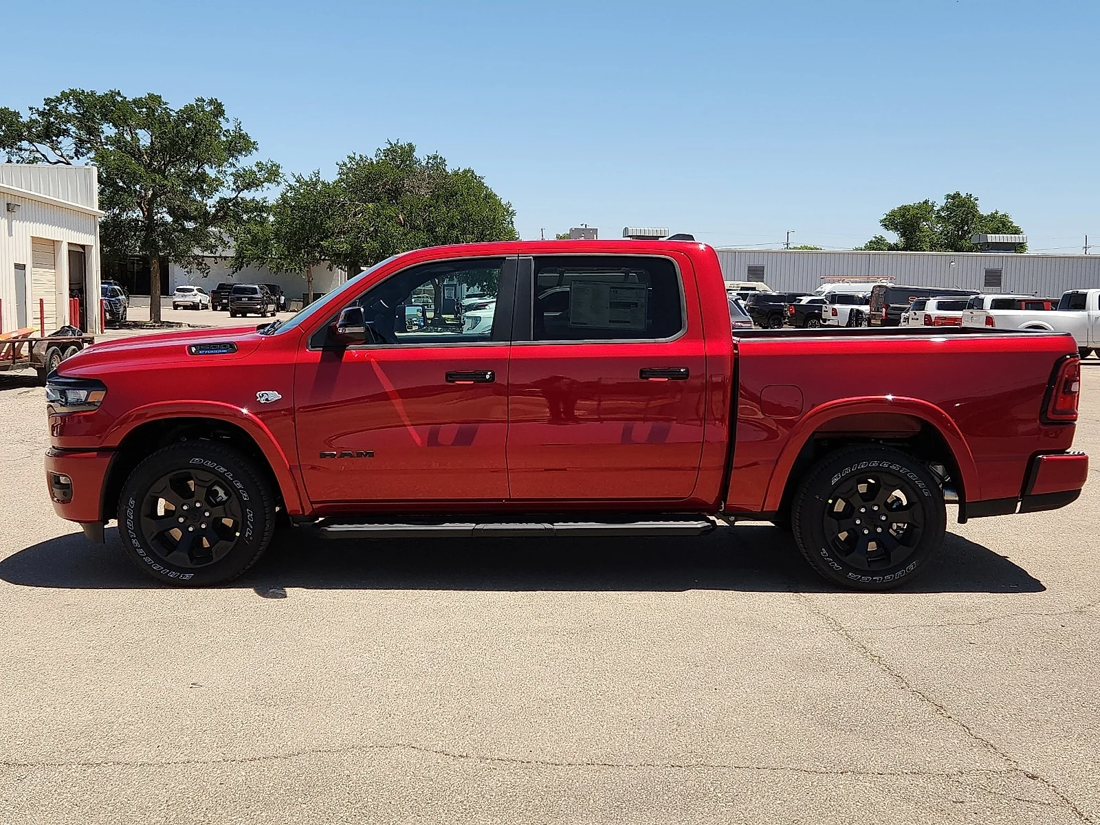 New 2026 Molten Red Pearl-Coat  Paint Ram LONE STAR CREW CAB 4X4 5