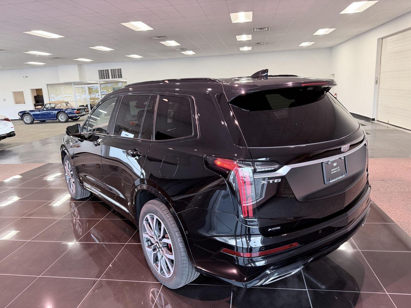 Used 2024 Stellar Black Metallic Cadillac Sport image 4