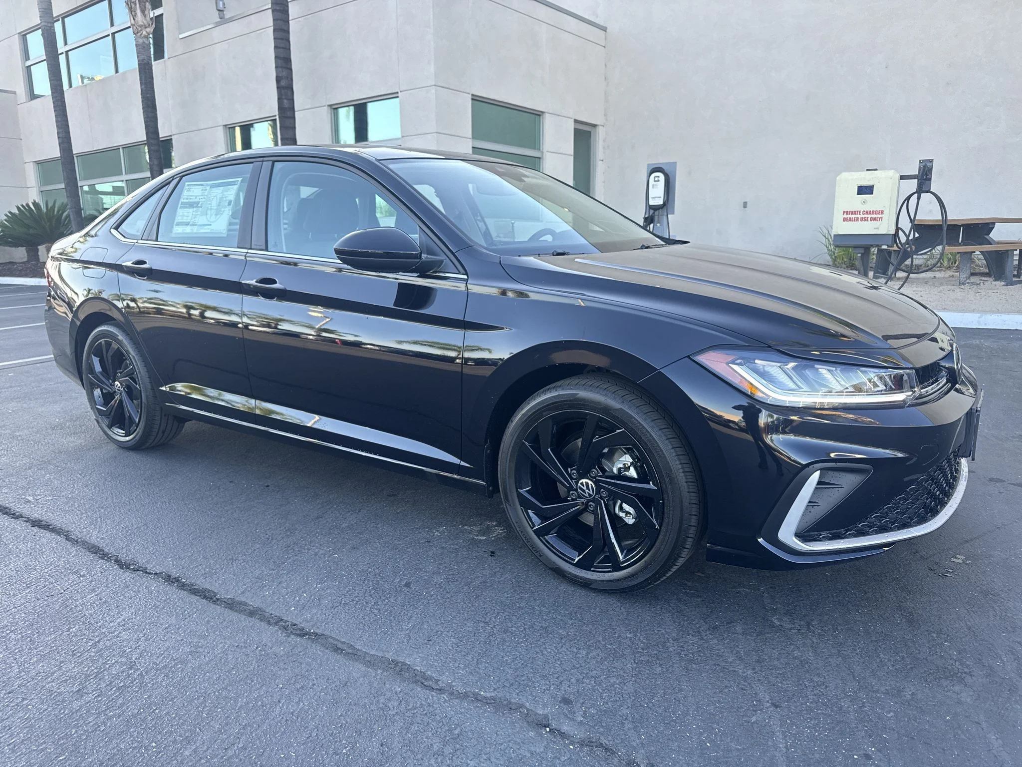 New 2026 Deep Black Pearl Volkswagen SE image 1