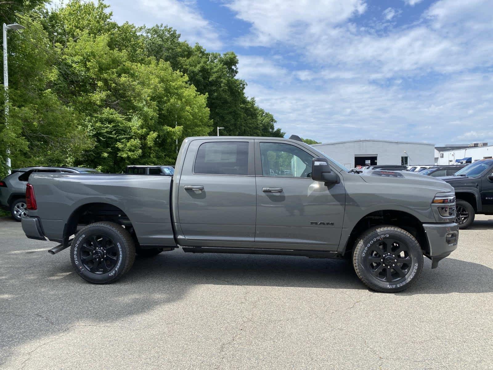 New 2026 Ceramic Gray Clear-Coat Exterior Paint RAM Laramie image 2