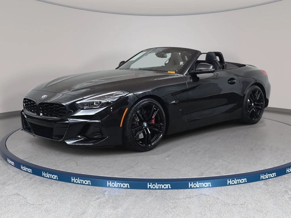 Used 2023 Black Sapphire Metallic BMW sDrive M40i image 1