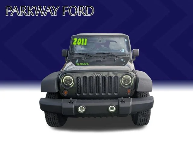Used 2011 Green Jeep Unlimited Sport image 3