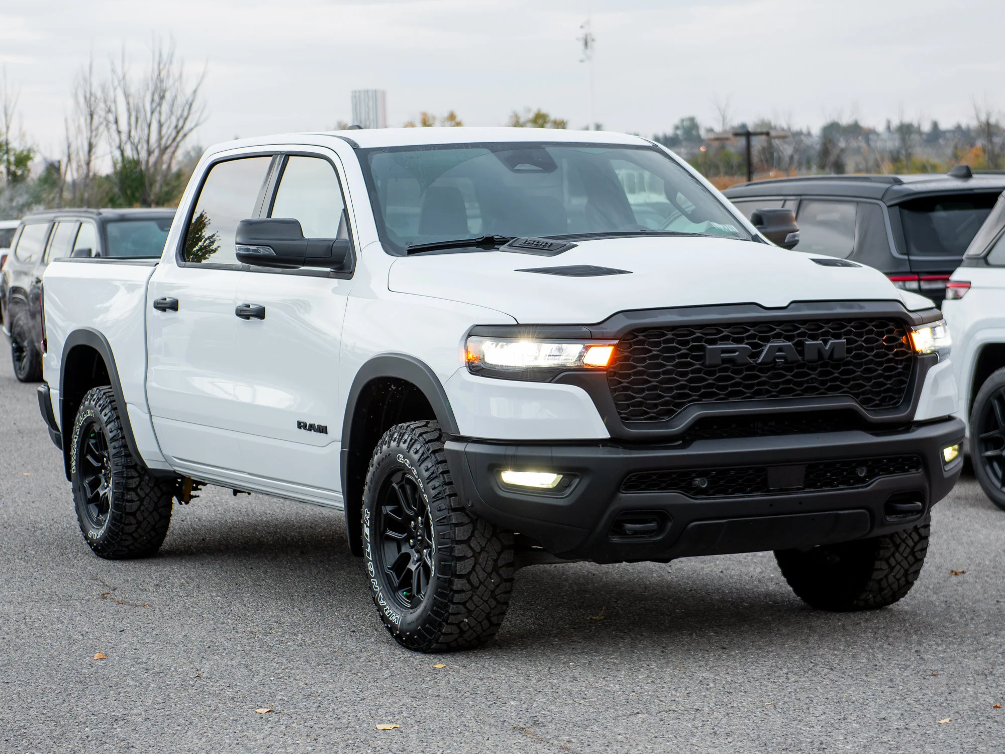 New 2026 White RAM Rebel* Crew Cab 4x4, Heated Seats/Wheel, 33 Inch A/T Tires, Rear Locking Diff image 9