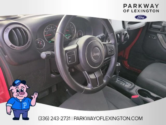 Used 2016 Red Jeep Unlimited Sport image 15