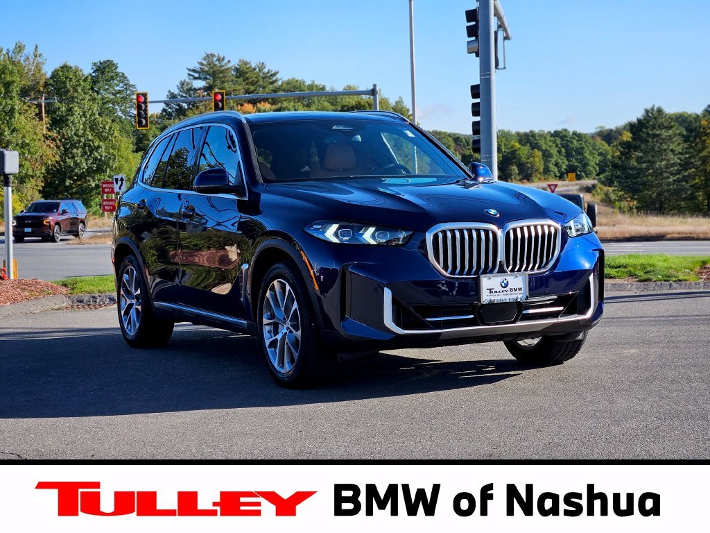 Certified Used 2026 Tanzanite Blue II Metallic BMW xDrive40i image 1