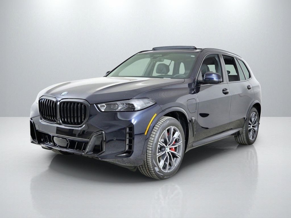 Used 2026 Carbon Black Metallic BMW xDrive50e image 1