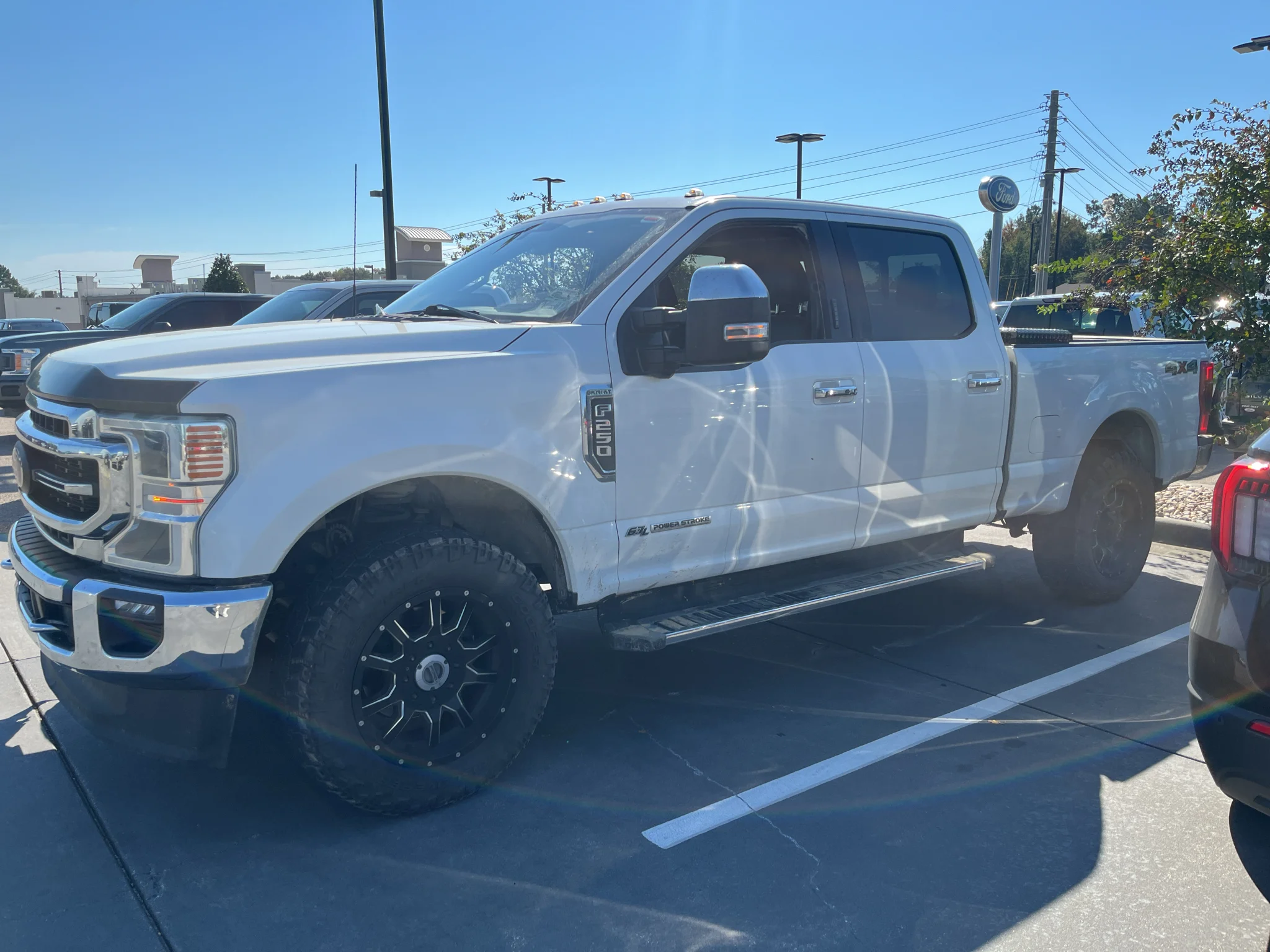 Used 2022 Star White Metallic Tri-Coat Ford LARIAT image 1