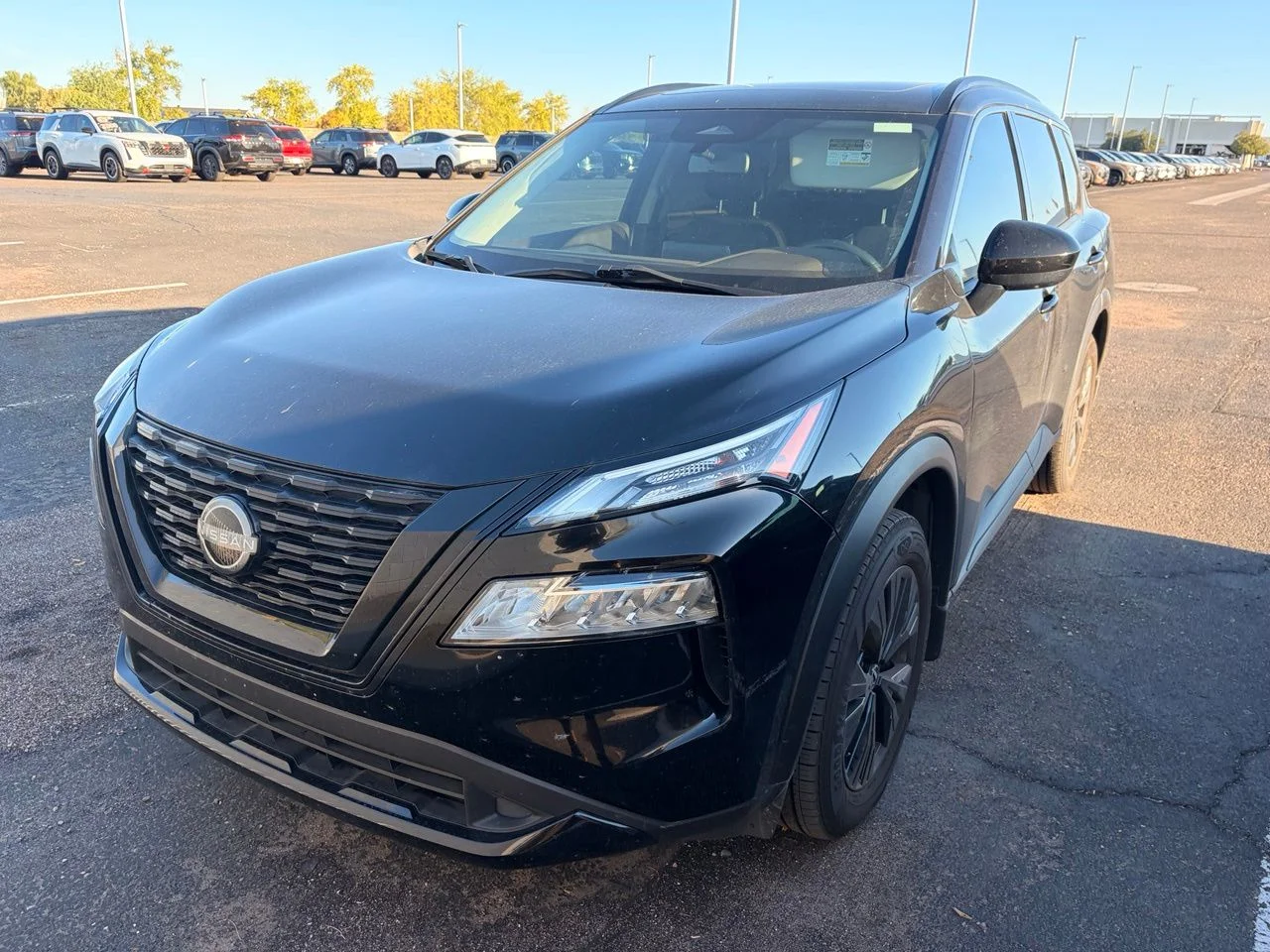 Used 2023 Super Black Nissan SV image 1