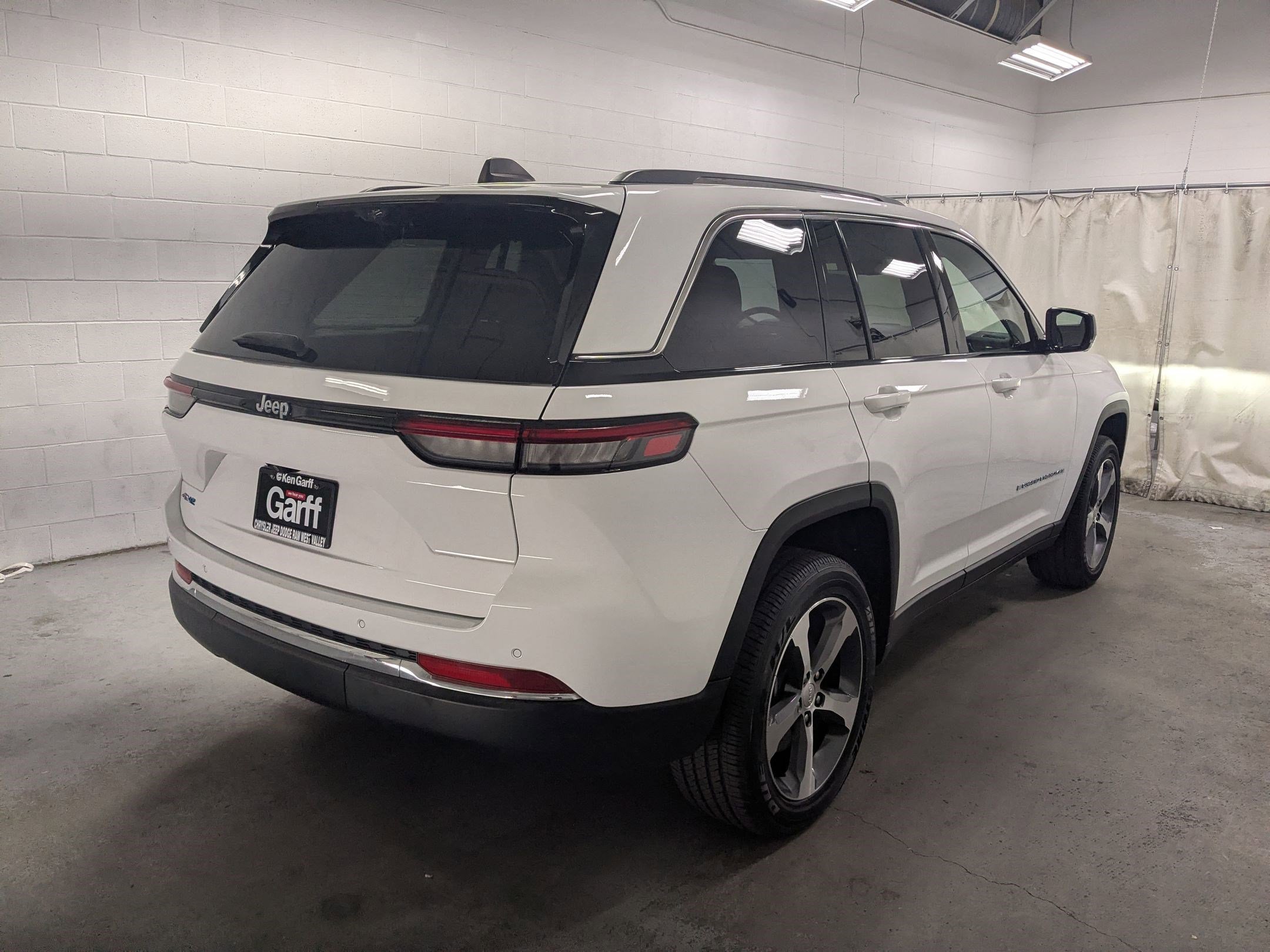 Used 2023 Bright White Clearcoat Jeep 4xe image 4