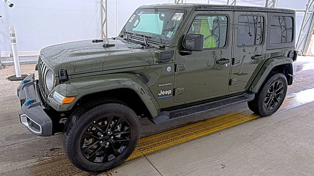 Used 2023 Green Jeep Sahara 4xe image 1