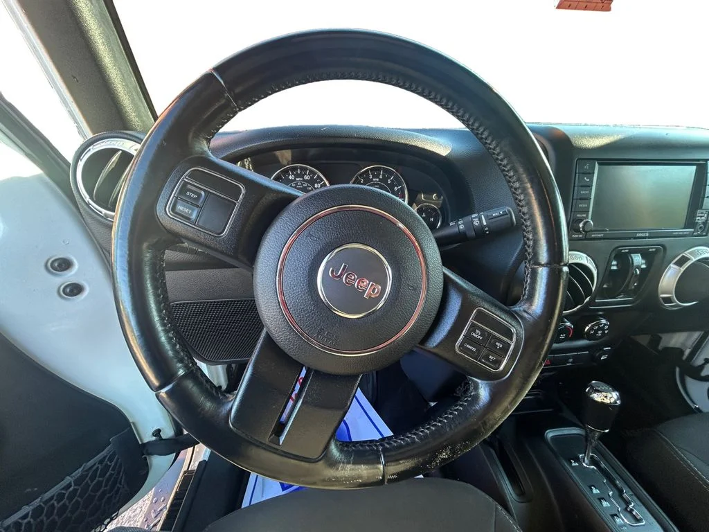 Used 2018 Bright White Jeep Unlimited Sahara 4x4 image 13