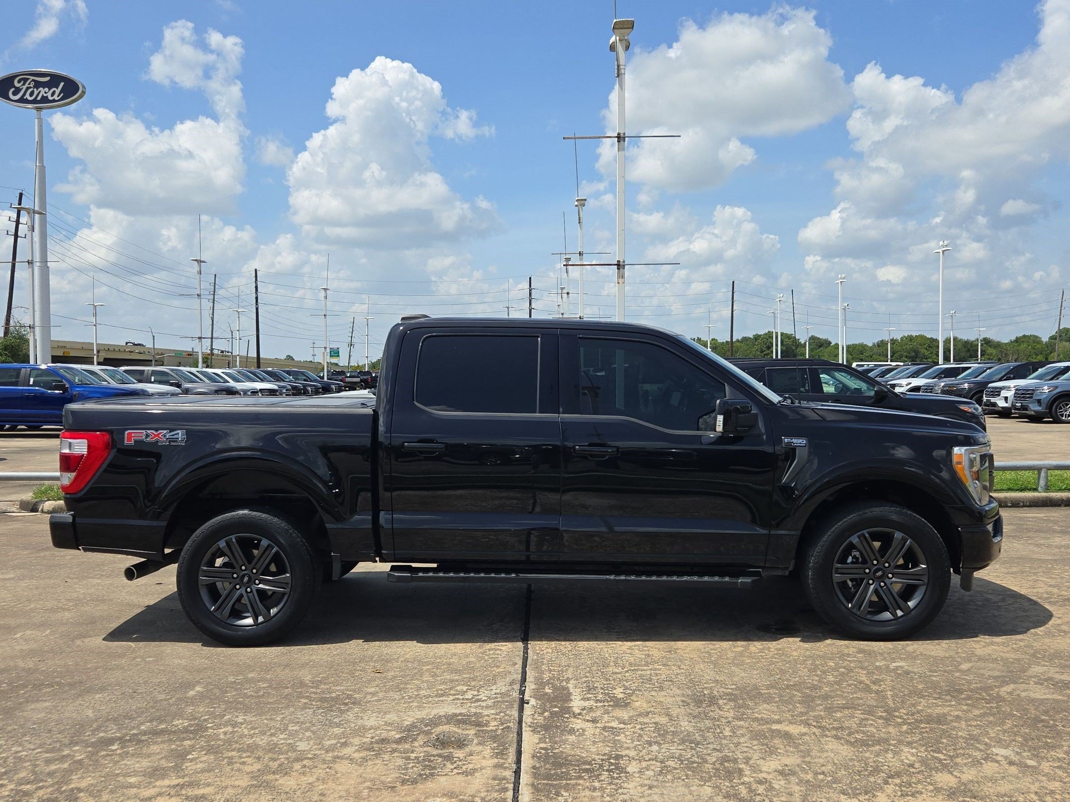 Used 2023 Agate Black Metallic Ford Lariat image 2