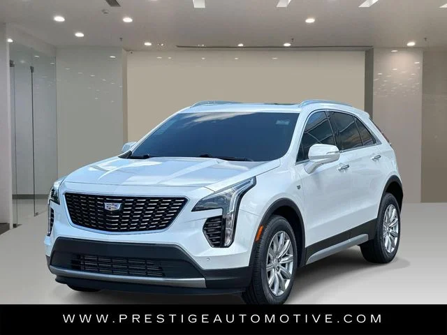 Used 2023 White Cadillac Premium Luxury image 1