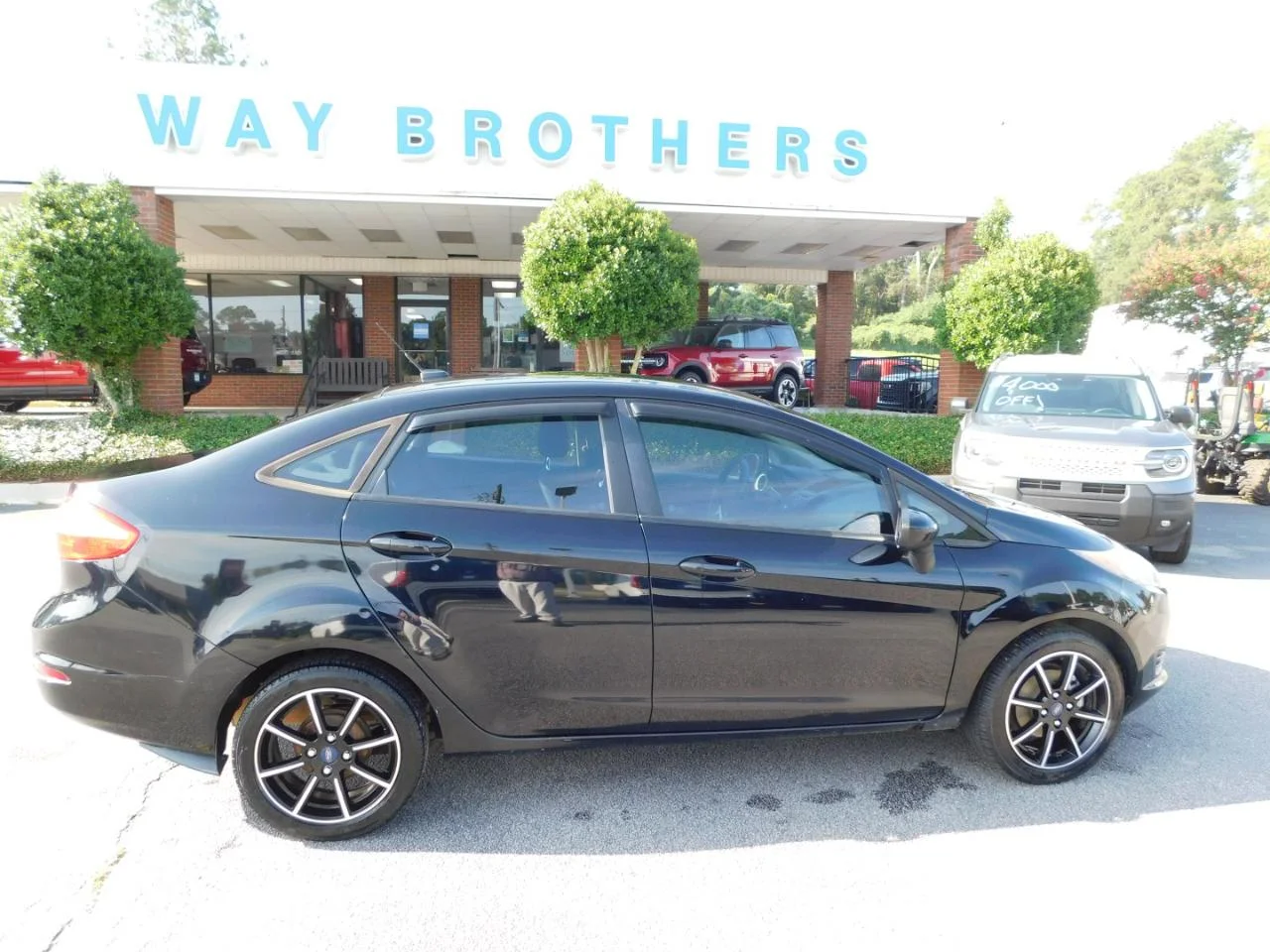 Used 2018 Black Ford SE SEDAN image 1