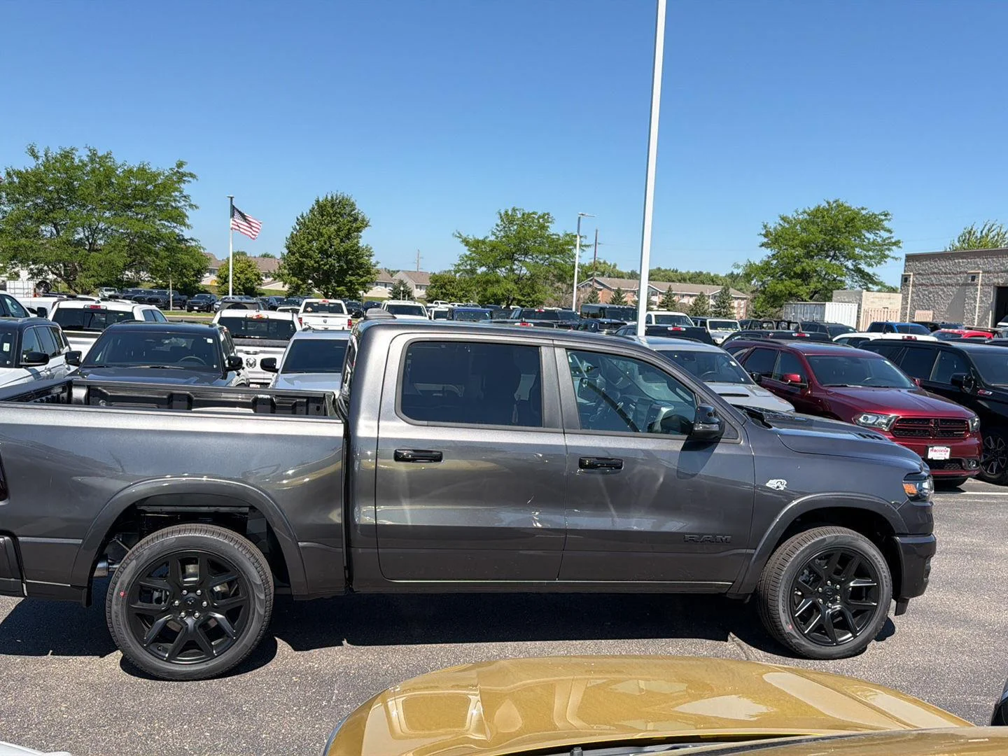 New 2026 Granite Crystal Metallic Clear-Coat Exterior Paint RAM Laramie image 8