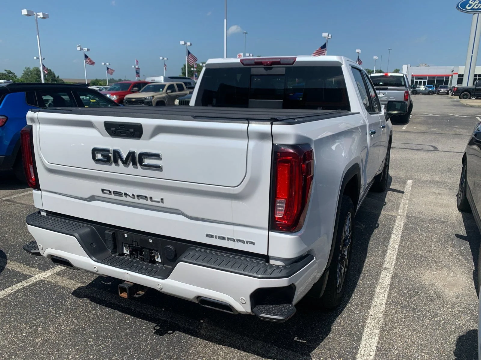 Used 2024 White Frost Tricoat GMC Denali Ultimate image 2