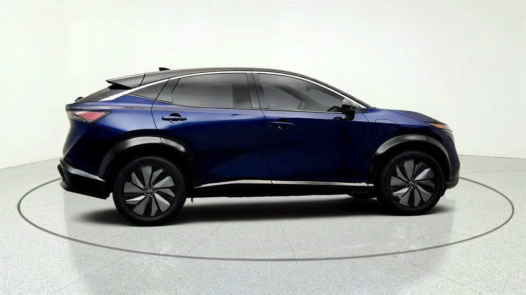 Used 2025 Deep Ocean Blue Pearl/Black Diamond Pearl Nissan EVOLVE+ FWD image 4